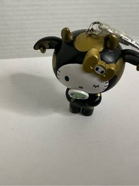TOKIDOKI Black And Gold Cow Hello Kitty